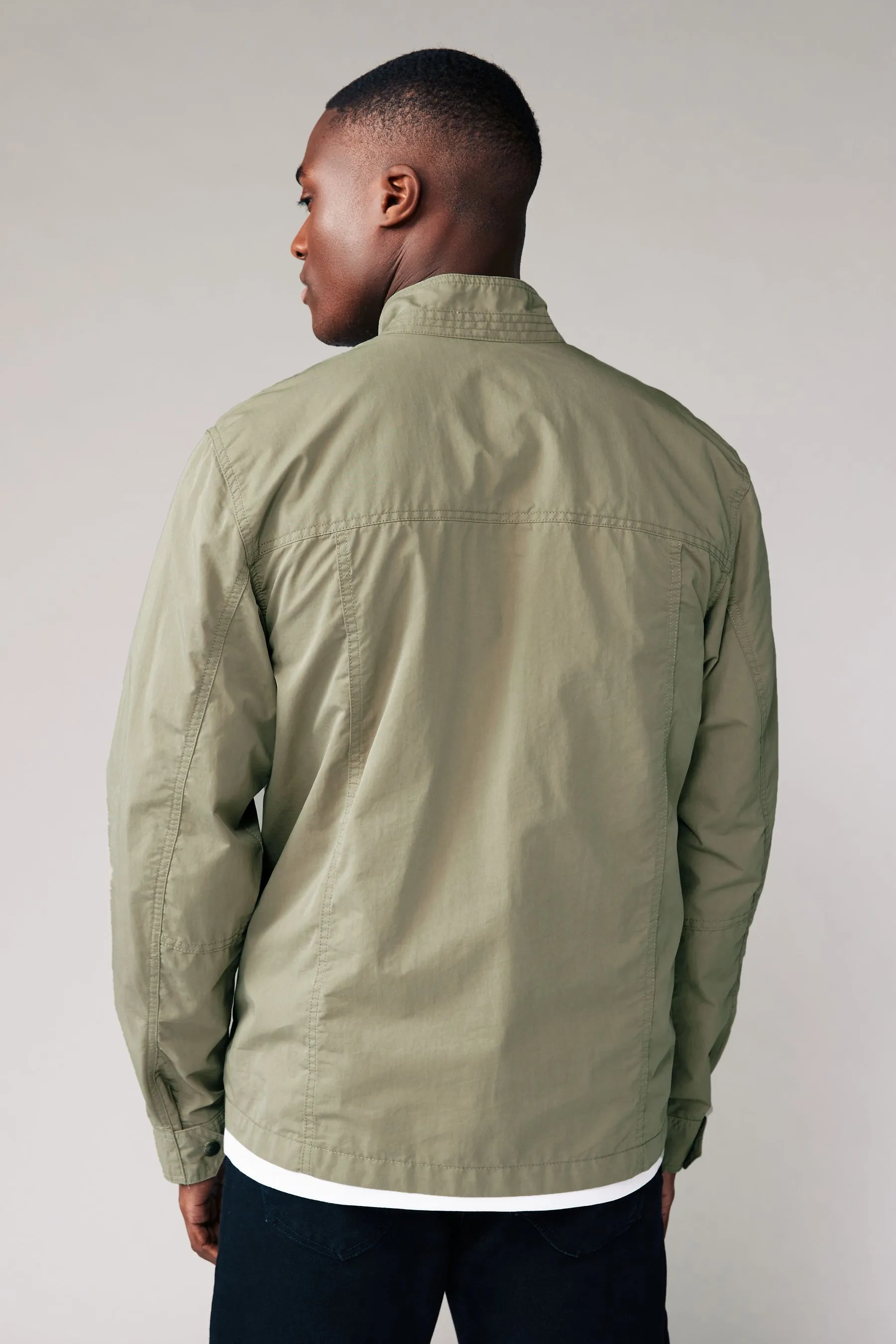 Impermeabile stile camicia multitasche